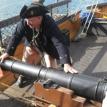 Cannon battle aboard HMS Surprise.